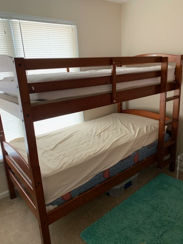 Twin bunk bed with matress and bunkie boards