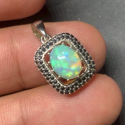 White Ethiopian Opal Full Spectrum Pendent In Silver Metal