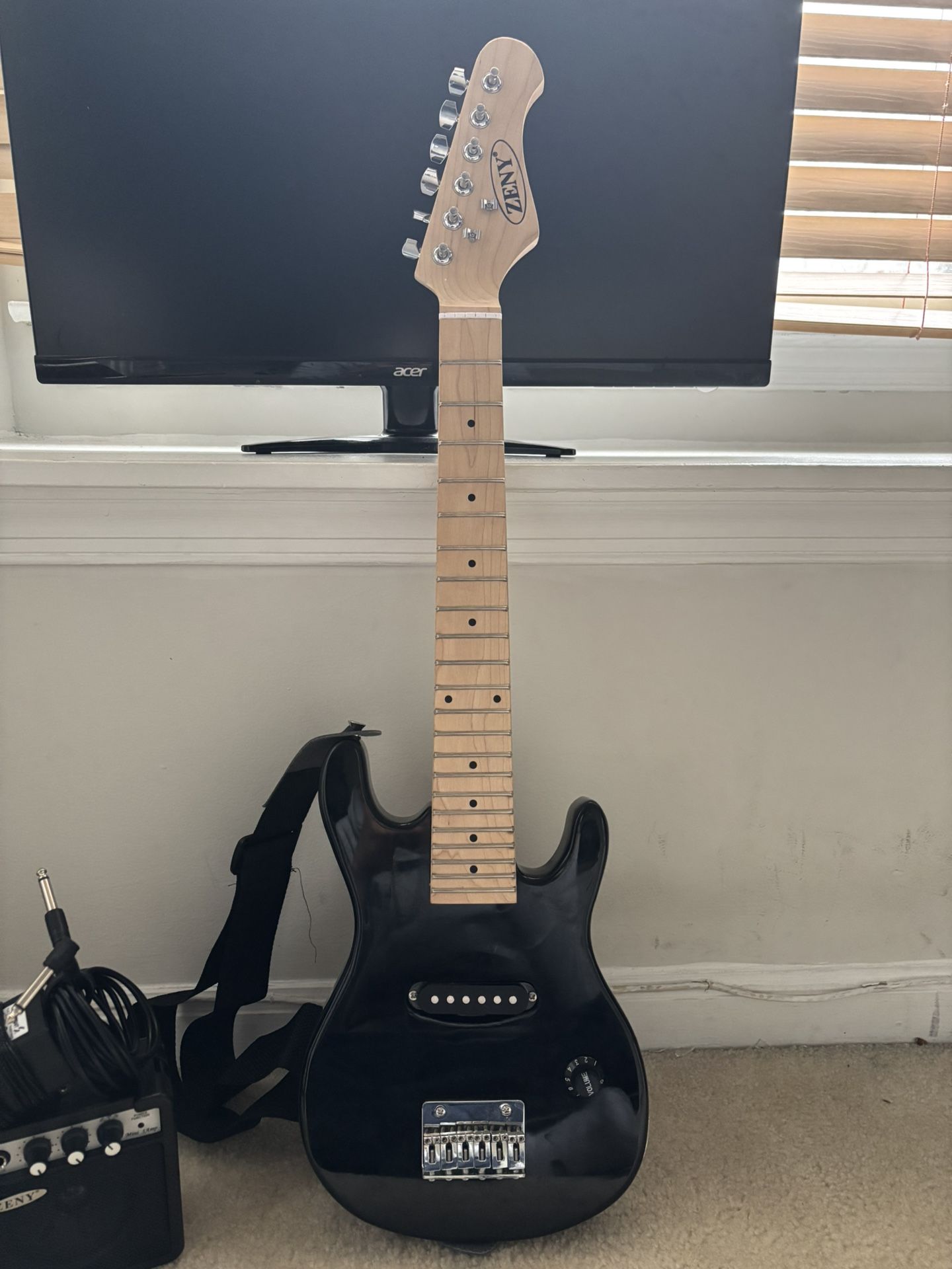 mini Electric Guitar with amp looking To Sell