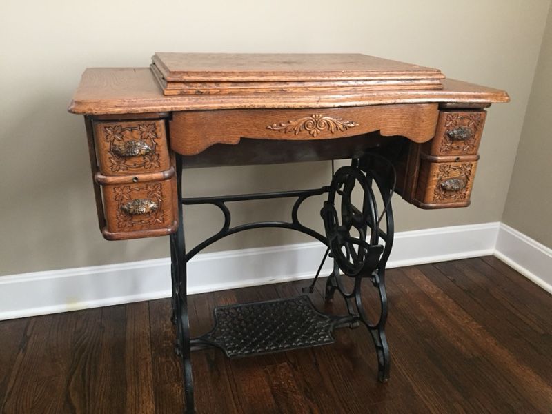 Honeymoon Treadle Sewing Machine in Carved Oak Cabinet