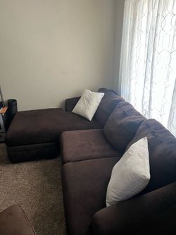 Brown sectional couch small rips on top pillow (No delivery , pick up required )