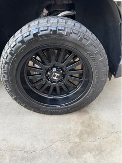 20x10 hostile wheels asphalt black with ridge grappler tires