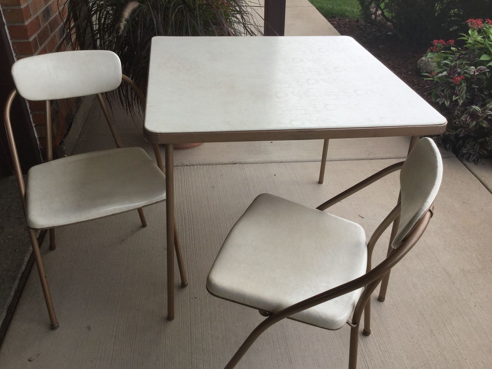 FOLDING TABLE AND 4 CHAIRS, USED BUT IN GOOD CONDITION!