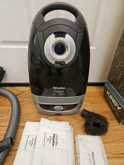 New Cond MIELE. VACUUM WITH ATTACHMENT  , WORKS EXCELLENT 