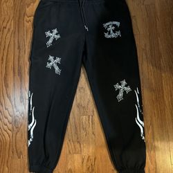GREATNESS PLUS WEALTH (Cross & Flame Pants)