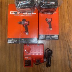 (1) Milwaukee M18  Fuel Hammer Drill/Driver(2904-20)  (1)M18 Fuel Impact Driver(2953-20)  (2) M18 5.0 Ah XC Battery  (1) M12/M18 Charger