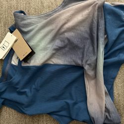 Two Nike Women’s Tops Fit Like A Large