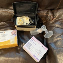 Breast Pump And Assesories