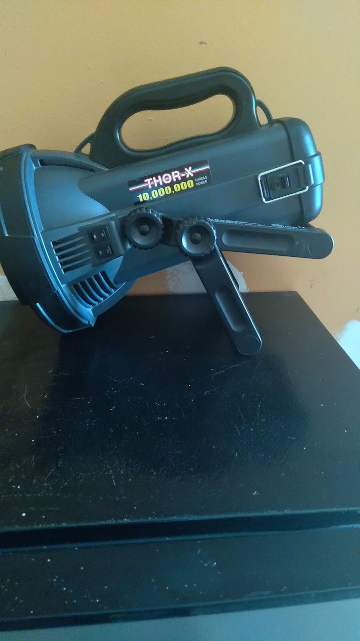 THOR - X 10,000,000 Candle Power Flashlight.