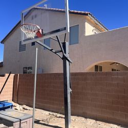 	•	Pro-Grade Rhino Courts Adjustable Glass Backboard Hoop