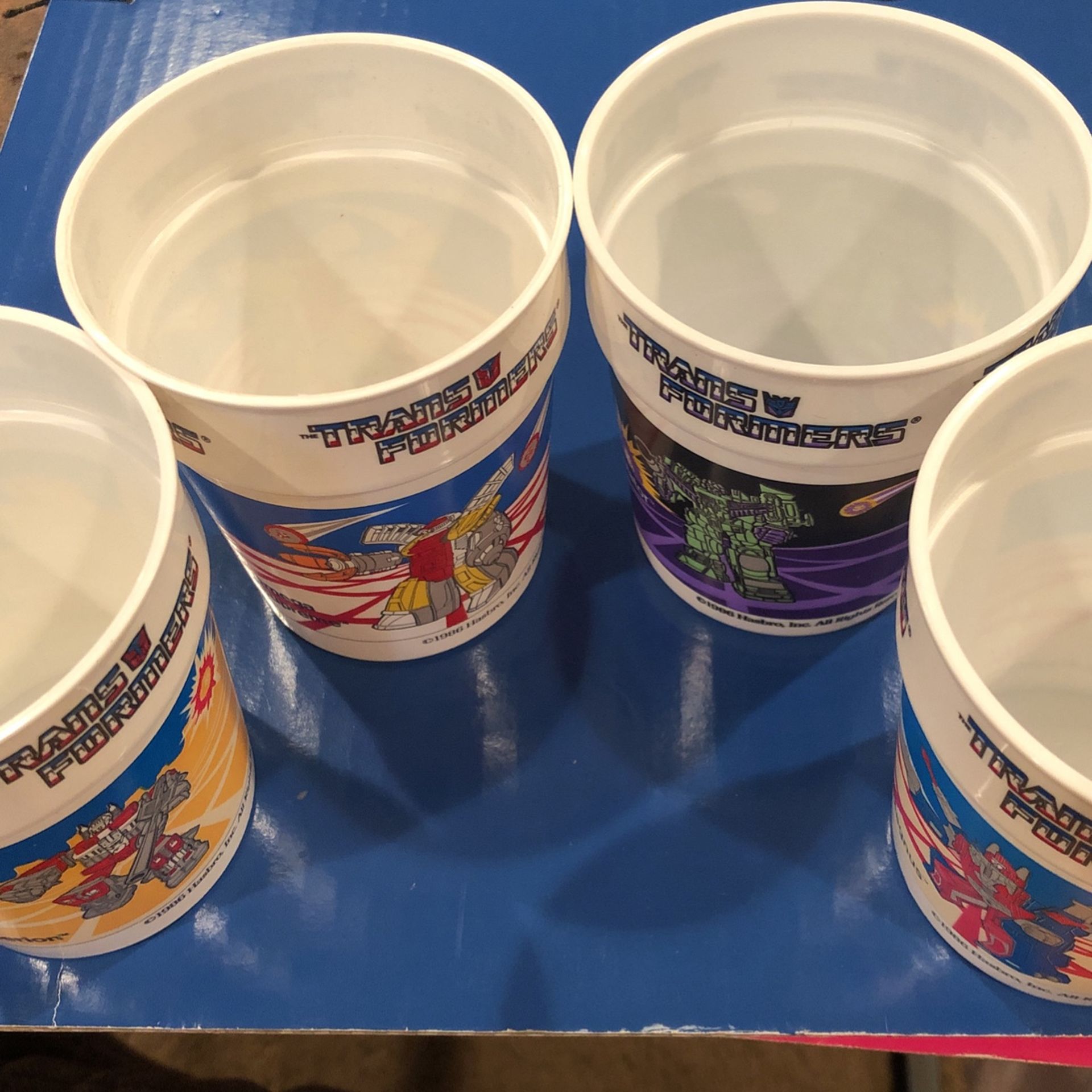 1986 Rare Transformers 4 Plastic Cups( Ultra Magnus Superion Devastator Omega Supreme