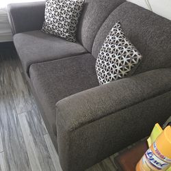 Grey small loveseat