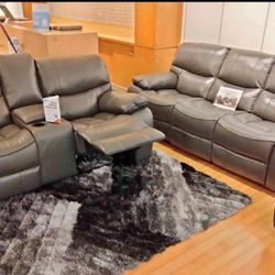 Labor Day Sale. Madrid, gray leather reclining sofa and loveseat set only $1099. Easy finance option. Same-day delivery