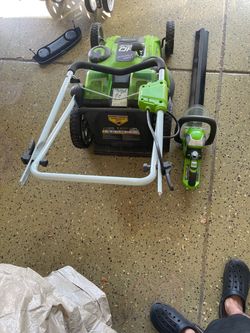 Greenworks lawnmower and trimmer with two batteries and charger