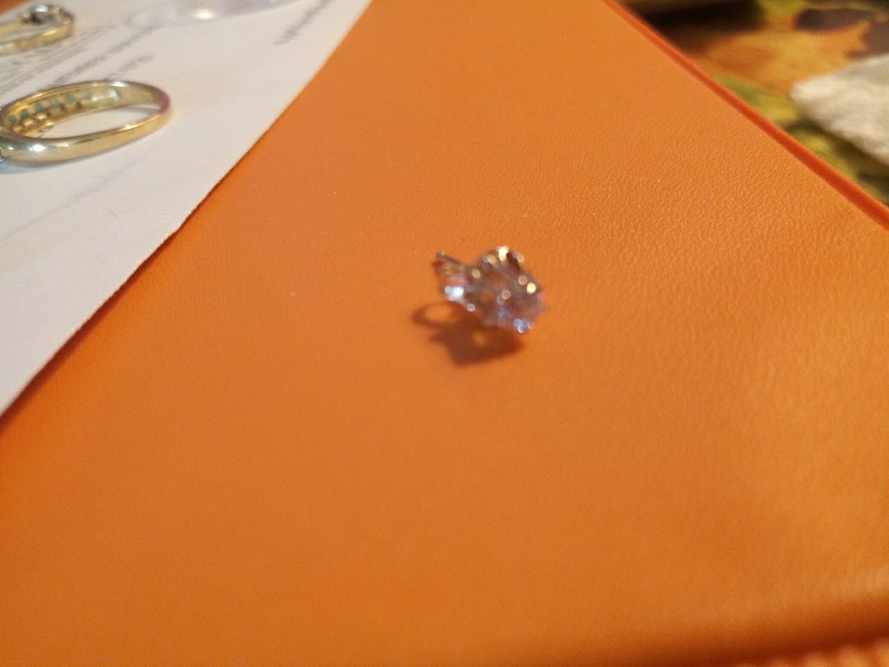 14k gold solitary Diamond one earing