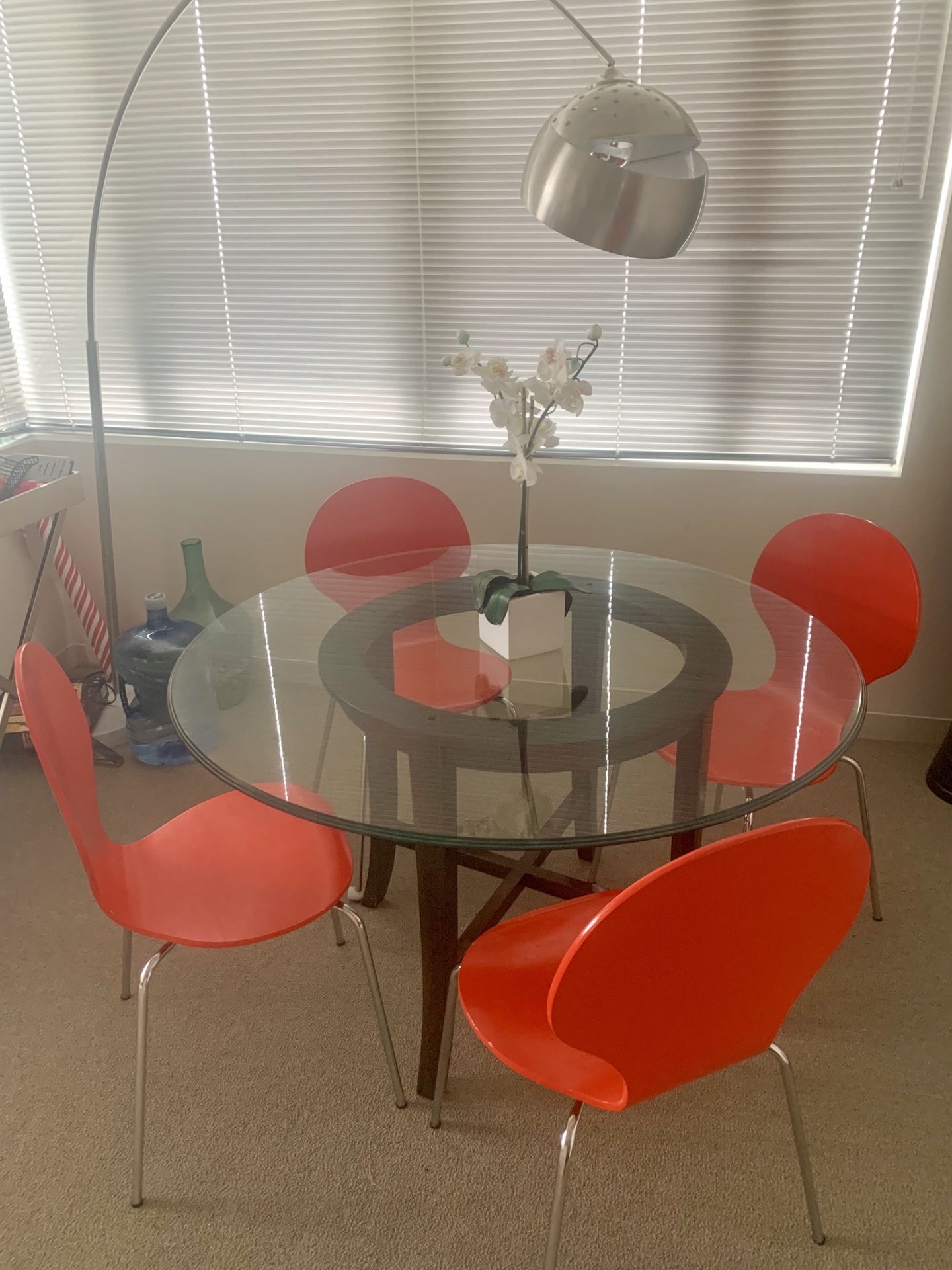 Round Glass Table with 4 Red Chairs. Flower included :)