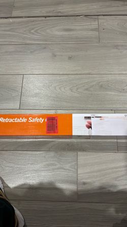 Retractable safety gate