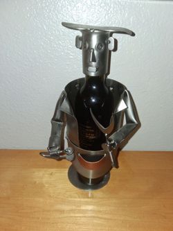 Metal art wine holder