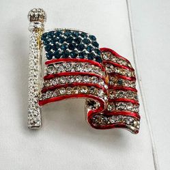 Vintage, marked “TC” for Tanya’s Creations, USA patriotic waving America flag brooch. Red,white,blue Pendant