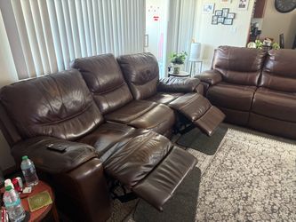 Reclining full leather couch and loveseat