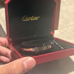 Cartier Silver with diamonds love bracelet