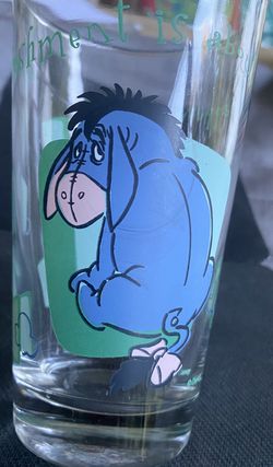 Disney Eeyore glass tumbler " A refreshment is about to happen" Nice collectible 5 7/8" tall tumbler. Disney trademark. Nice thick bottom and opening
