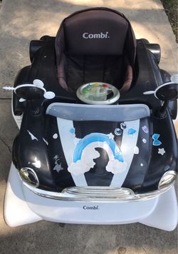 Baby Walker plays music asking $20 Obo Slauson ave /western