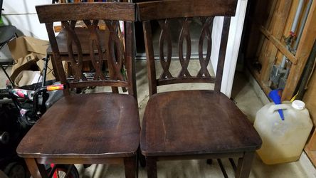 High wooden chairs