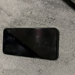 Black iPhone X, Small Crack In Camera But Works In Good Condition.