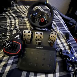 Logitech g29 steering wheel, thrust master 7 speed H shifter, and Hand break for pc sim racing.