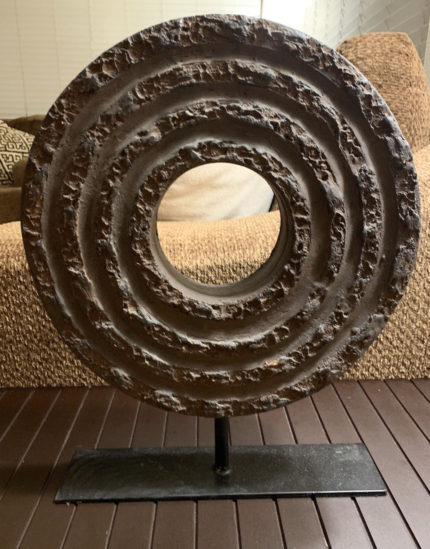 Decorative stone wheel mantle piece