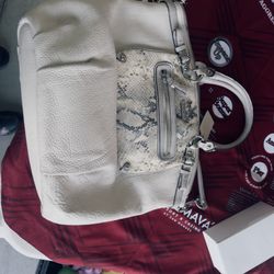 This is a Coach Madison Lindsey satchel in an ivory or cream color with python embossed leather accents