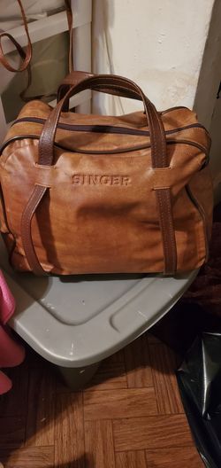 Singer camel leather travel bag