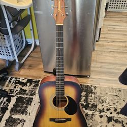 Guitar With Holder  One Thing 