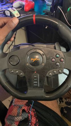 Steering wheel w peddle and flight sticks