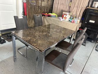 Dining table and four chairs