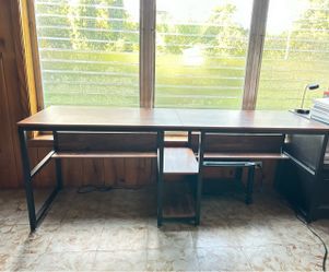 Two people computer desk