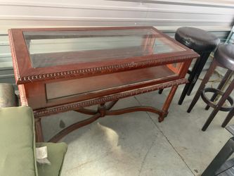 Nice display cabinet opens on side