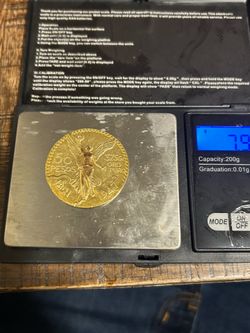 14k gold centenario coin