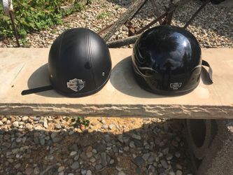 2 helmets , 1 small & 1 extra large