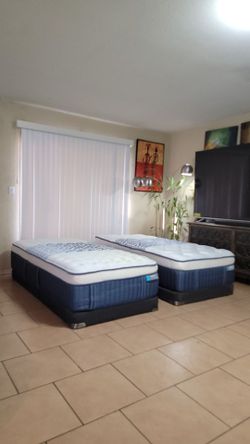 2 VERY NICE XL TWIN MATTRESSES AND BOXSPRINGS FOR SALE! IN GREAT CONDITION, FREE DELIVERY