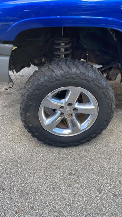 20 inch Dodge Ram wheels and tires 35x12.50r20 set of 4
