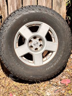 Nissan OEM Wheel with All-Terrain Tire