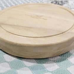 New, Never Used cheese board with hidden stainless steel grater, slicer set. 