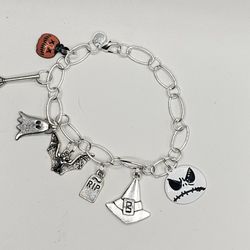 charm sterling silver chain link bracelet Halloween orange pumpkin broom ghost bat grave RIP witch hat and mad jack skellington black and white jewelr