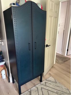 Armoire with two side tables