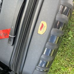 Two large 3 foot suitcases $75 each hard cover