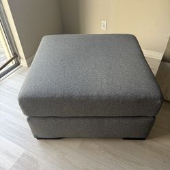 BRAND NEW! Large gray Ashley Furniture Ottoman