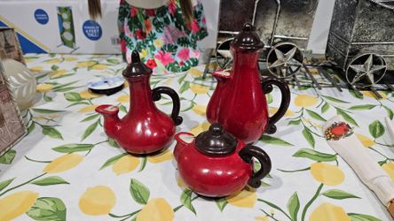Set of three teapot candle holders