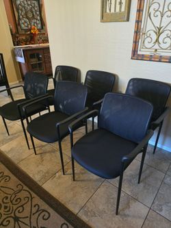18 black Lorell mesh/fabric guest chairs with arms
